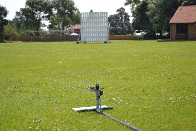 Sprinkler on a cricket pitch