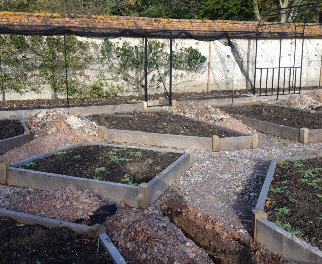 Image of phased installation of garden irrigation - hard landscaping phase of the project when the underground pipework is laid