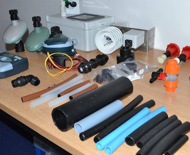 Image of irrigation systems parts/items ready for Irrigation Training Course