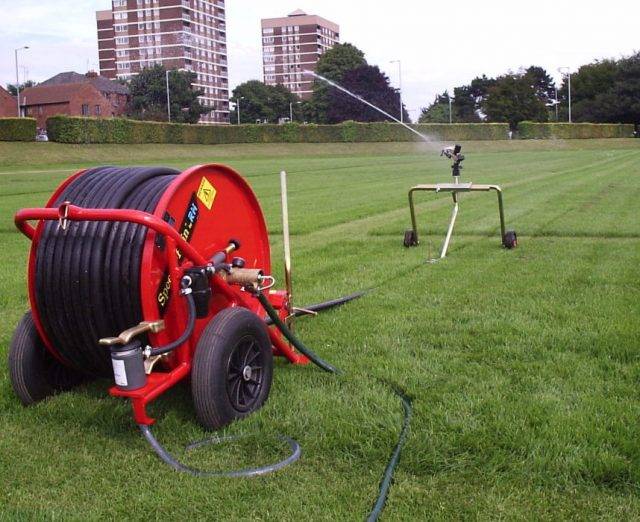 Reel irrigator on football pitch
