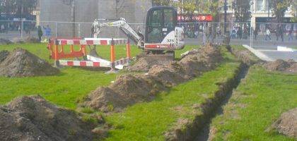 Trenches for irrigation pipe to ready be installed