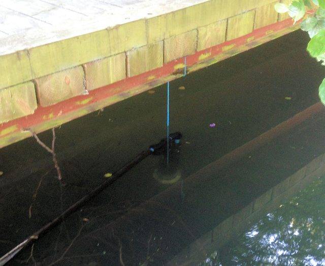 Image of submersible pump in lake