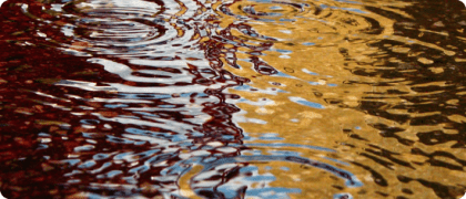 Image of water reflections in rain puddle