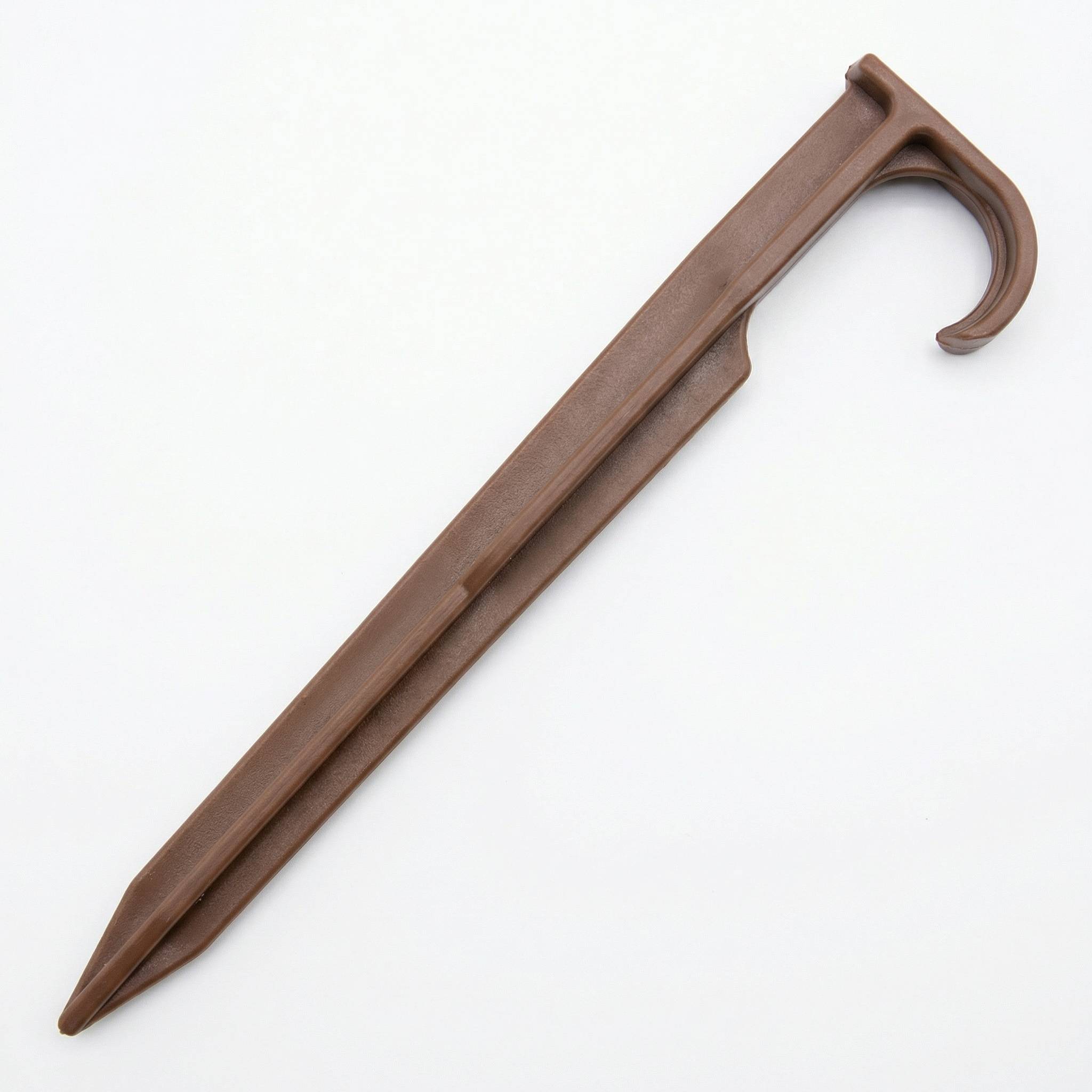 Brown anchorage peg for dripline