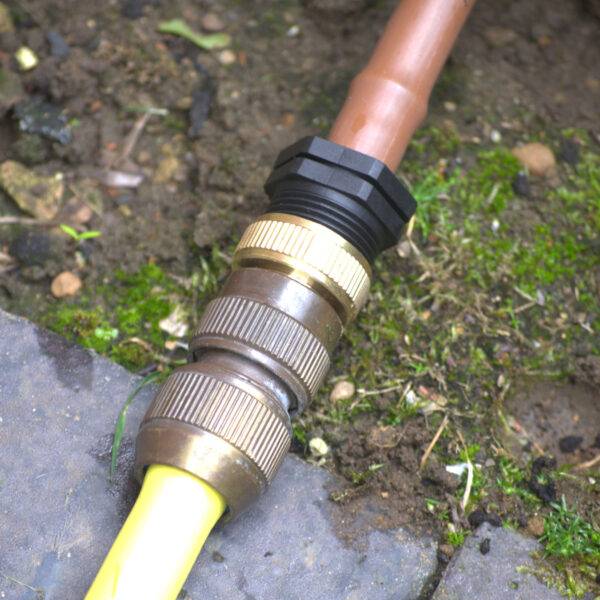 Tricoflex hose connected to Permadrip Pro drip pipe using brass and plastic connectors