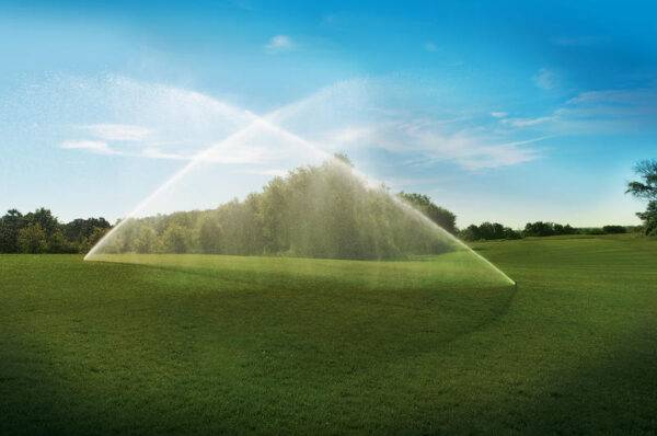 Lawn watered using Hunter I-25 large scale stainless steel pop-up sprinkler system
