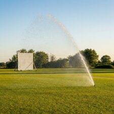 Pop up sprinkler on a cricket pitch
