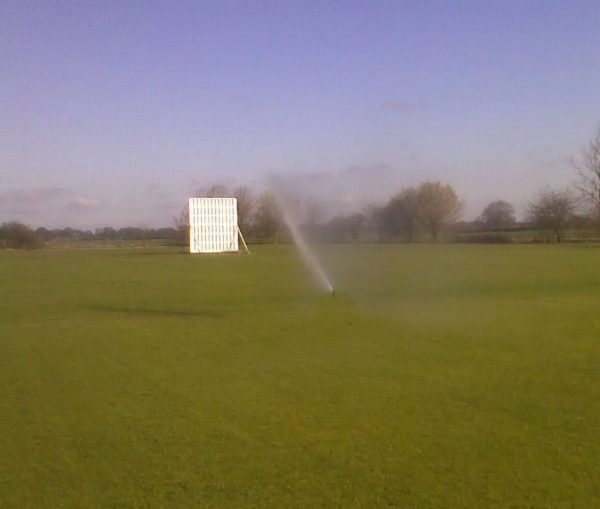 Pop-up cricket square irrigation package including pump and storage tank with automatic control