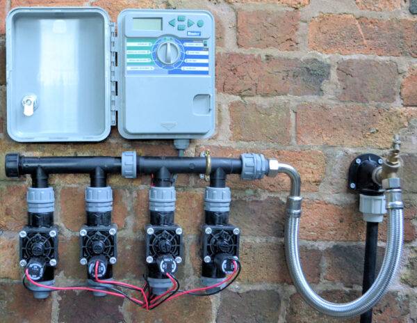 Multi zone tap manifold with Hunter controller connected directly to outdoor tap