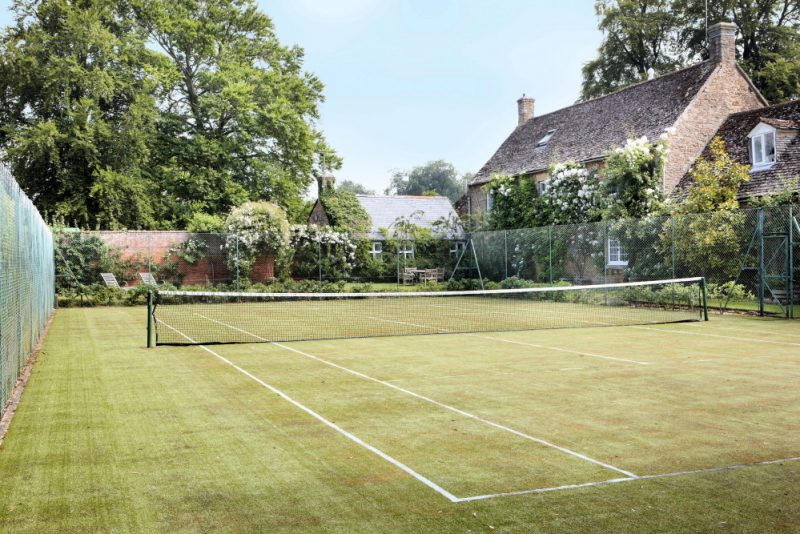 Grass tennis court at a house