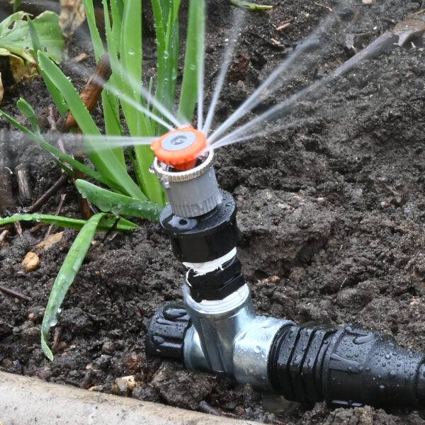 Border spray watering kit with gentle half circle sprinklers