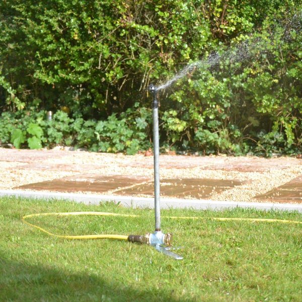 Cross Base Sprinkler Riser with Naan sprinkler and Tricoflex hose ideal on hard standing areas to provide temporary watering for bedding plants and standing out ares