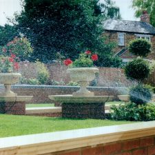 Garden with pop up lawn watering sprinklers