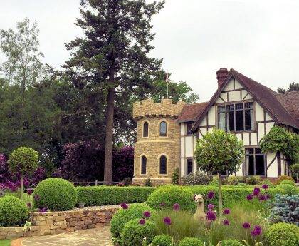 Garden grounds, lawns, planted borders and allotment garden of Shamley Wood House watered by irrigation systems designed and supplied by Access Irrigation