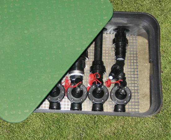 Irrigation solenoid valves in underground valve box with a lid