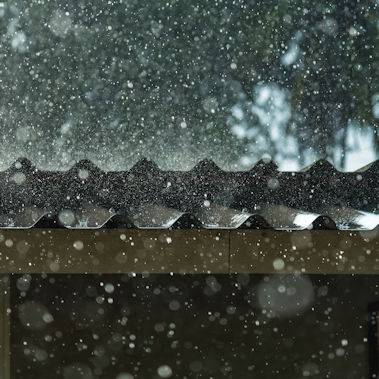 Storm rain on the roof of the house