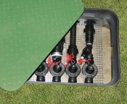 Irrigation solenoid valves in underground valve box with a lid